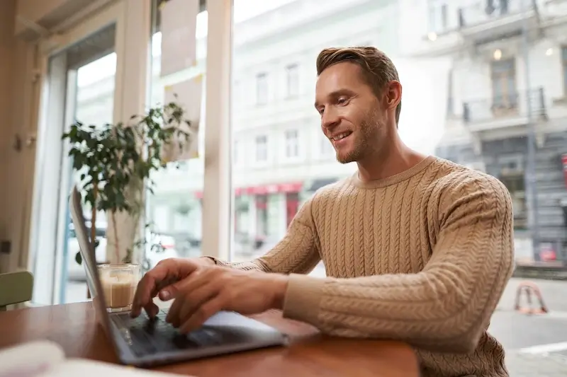 Kentucky business owner working on laptop