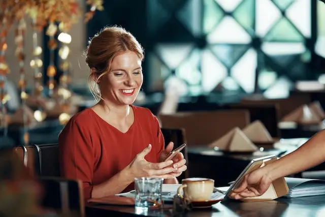 A diverse group of smiling people interacting, symbolizing satisfied customers giving testimonials and reviews