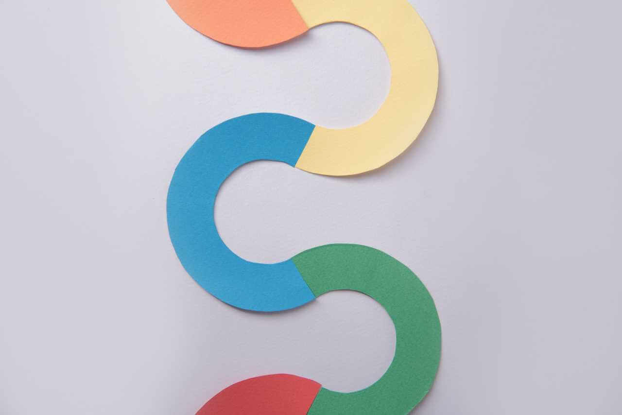 A stylized visual representation of seven looming red warning symbols, hinting at the new Google Ad Policy penalties to avoid